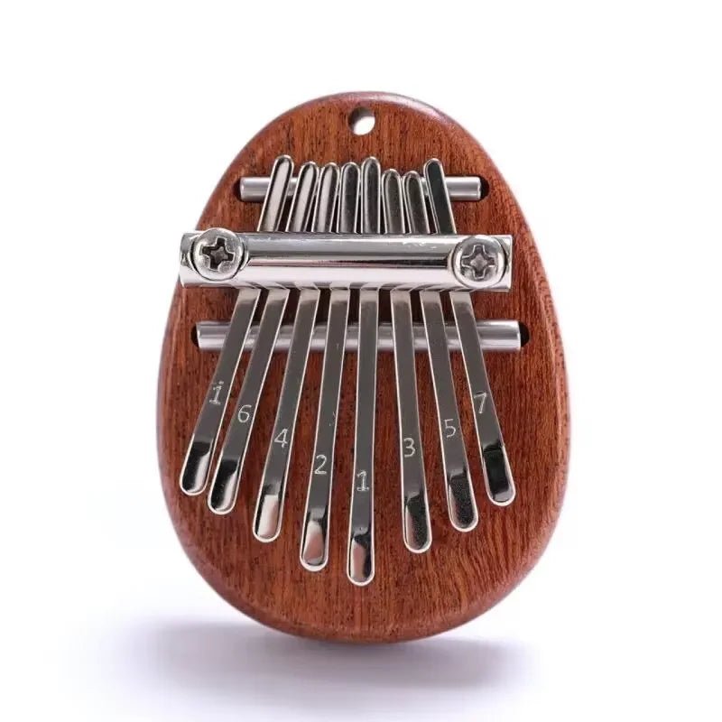 Mini Wooden Kalimba (8 - Key) – Pocket Thumb Piano Musical Instrument - Drop & Co.